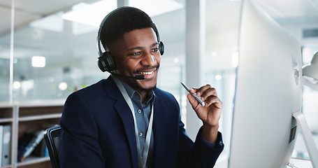 Image showing Computer, call center and black man talking, telemarketing and technical support at help desk. Communication, customer service and happy sales agent consulting, crm advisory and speaking to contact