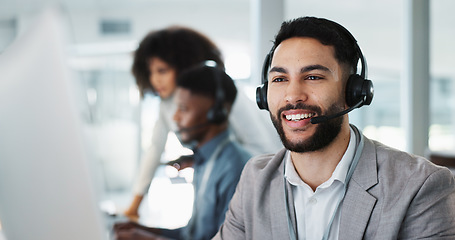 Image showing Happy businessman, call center and customer service in telemarketing, communication or support at office. Friendly man, consultant or agent smile in online advice, help or contact us at workplace