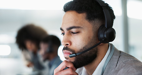 Image showing Employee, customer service and working in call center, thinking and Indian man with consulting. Receptionist, technology and communication with crm, corporate and telemarketing in office environment