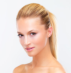 Image showing Portrait, skincare and makeup of a woman closeup in studio on a white background for luxury wellness or cosmetics. Face, beauty and cosmetics with a confident young model at the salon for dermatology