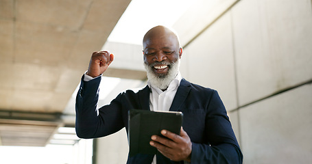 Image showing Tablet, celebration and senior businessman in the city with good news, job promotion or winning. Happy, digital technology and professional African male lawyer with fist pump for success in town.