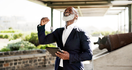 Image showing Businessman, happy and success with tablet, hand gesture and social media with happiness in city. Mature, black manager and technology with schedule, stock market and celebration with competition.