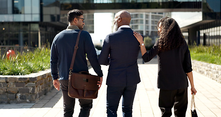 Image showing Business people, city walking and back with conversation outdoor with work commute and travel. Urban, sidewalk and working staff with employee and communication with networking and worker friends