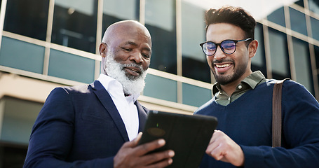 Image showing Tablet, discussion and businessman with manager in the city planning a legal strategy. Meeting, digital technology and team of professional lawyers working on case in collaboration in urban town.