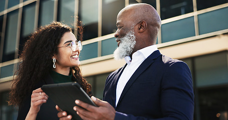 Image showing Tablet, talking and businesswoman with manager in the city planning a legal strategy. Discussion, digital technology and team of professional lawyers working on case in collaboration in urban town.