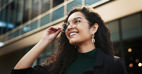 Image showing Smile, vision and opportunity with a business black woman outdoor in the city for energy or inspiration. Face, thinking and glasses with a happy young employee looking to the future in an urban town