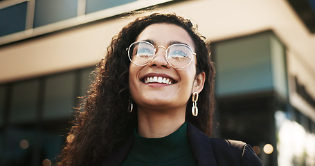 Image showing Smile, vision and opportunity with a business black woman outdoor in the city for energy or inspiration. Face, thinking and glasses with a happy young employee looking to the future in an urban town