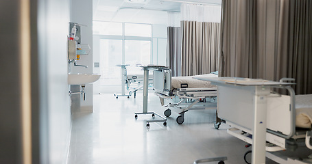 Image showing Hospital, modern and interior of bedroom or empty room for healthcare, consulting or healing. Background, medical and clinic space for emergency, rehabilitation or recovery with furniture or light