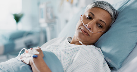 Image showing Medical, iv drip and senior woman in the hospital for consultation, surgery or treatment. Healthcare, recovery and elderly female patient resting in bed after operation or procedure in a clinic.