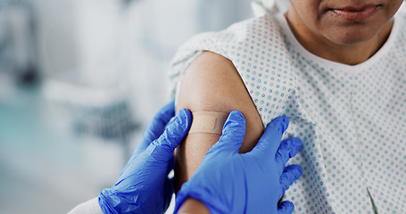 Image showing Doctor, hands and plaster on arm, vaccine and healthcare of patient in hospital. Nurse, bandage and injection of person closeup for medicine, virus immunity or help with treatment of injury in clinic
