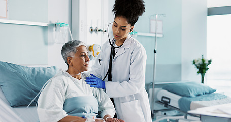 Image showing Hospital, doctor and woman breathing with stethoscope for diagnosis, medical service and checkup. Healthcare, clinic and health worker with mature patient for surgery recovery, wellness and healing