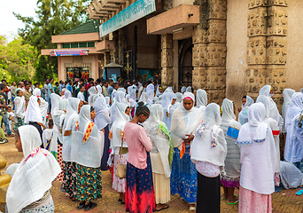 Image showing Celebrating Easter in Bahir Dar, Ethiopia. Men and women fill the streets, with women adorned in white scarves, reflecting the cultural traditions and festive atmosphere of the occasion.