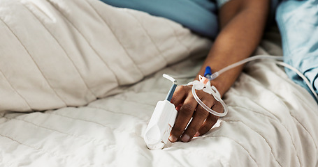 Image showing Iv drip, emergency and hand of patient in a hospital after surgery, treatment and operation in a clinic sleeping. Closeup, healthcare and person in medical ER for recovery, life support and medicine