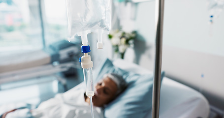 Image showing Hospital, IV drip and woman in a clinic bed for surgery or wellness emergency with closeup of liquid. Medical, healthcare and senior female patient with fluid for nutrition and infusion for health