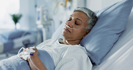 Image showing Sick, iv drip and senior woman in the hospital for consultation, surgery or treatment. Healthcare, recovery and elderly female patient resting in bed after operation or procedure in a medical clinic.