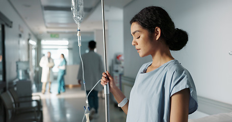 Image showing Sad, healthcare and a woman with an iv drip at hospital for medicine, wellness and recovery from virus. Depression, thinking and a clinic patient with treatment stress, burnout or anxiety while sick