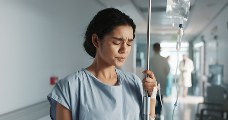 Image showing Sad, breathing and a woman with an iv drip at hospital for medicine, wellness and recovery from virus. Depression, thinking and a clinic patient with treatment stress, burnout or anxiety while sick