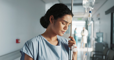 Image showing Sad, breathing and a woman with an iv drip at hospital for medicine, wellness and recovery from virus. Depression, thinking and a clinic patient with treatment stress, burnout or anxiety while sick