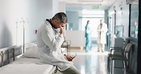 Image showing Stress, grief or mistake with a mature doctor in a hospital looking unhappy for healthcare or medical. Depression, fail or loss with a sad man medicine professional in a professional medicare clinic