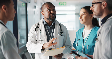 Image showing Doctors, nurses and team planning, hospital management and workflow discussion for schedule, advice or services. Healthcare worker, mentor and people with medical documents, clinic files and meeting