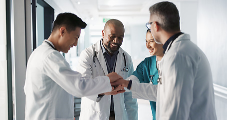 Image showing Doctors, nurses and hands together, applause and support, success or collaboration for hospital goals and teamwork. Medical or healthcare people clapping and stack for clinic mission and celebration