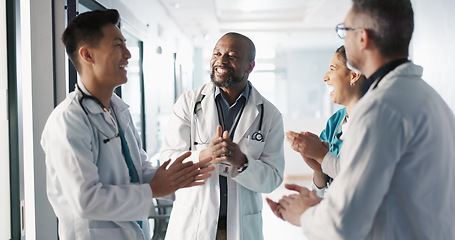 Image showing Doctors, nurses and hands together, applause and support, success or collaboration for hospital goals and teamwork. Medical or healthcare people clapping and stack for clinic mission and celebration