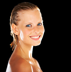 Image showing Skincare, happy and portrait of woman on black background for wellness, grooming and beauty. Dermatology, luxury spa and face of person smile with wet hair for shower, washing and cleaning in studio