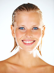 Image showing Shower, happy and portrait of woman on a white background for wellness, grooming and beauty. Water, luxury spa and face of isolated person with wet hair for skincare, washing and cleaning in studio