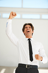 Image showing Business, man and screaming for success in office to celebrate profit, happy promotion or winning deal. Excited corporate worker, winner and shouting with fist for celebration, cheers or bonus reward