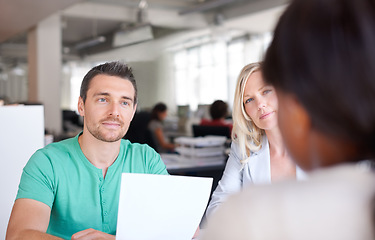 Image showing Business people, meeting and job interview with resume, CV or paper at startup company, recruitment and hiring process. Professional clients, employer and manager listening for internship opportunity