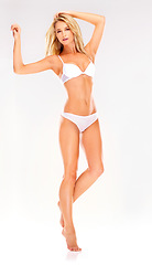 Image showing Skincare, underwear and portrait of woman on a white background for wellness, beauty and shaving. Dermatology, salon and isolated person in lingerie for grooming, cosmetics and smooth skin in studio