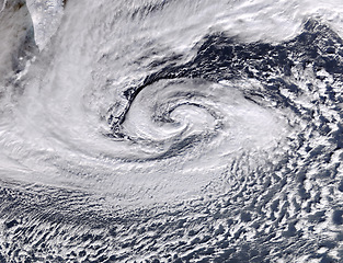 Image showing Hurricane, cyclone or weather pattern for warning of natural disaster or destruction from mother nature. Earth, sky and cloud formation of a storm in winter from a satellite to view a tornado