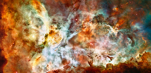 Image showing Cosmos, space and nebula dust in milky way with stars, gold light and color, glow or pattern on galaxy background. Cloud, sky and universe, aerospace or solar system for science or planets wallpaper