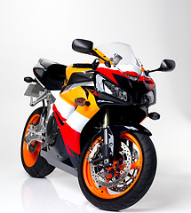 Image showing Motorcycle, super bike and transportation for sports in studio isolated on a white background. Motorbike, vehicle and transport tech, engine and machine for fast speed, travel and drive for freedom