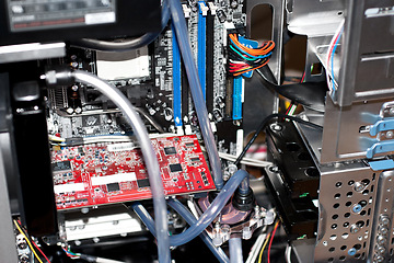 Image showing Closeup, computer hardware and cables with motherboard, RAM technology and data innovation of engineering. Background, electrical pc and maintenance of circuit board, cpu memory or upgrade GPU system