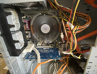 Image showing Closeup, computer hardware and cooling system with motherboard, RAM technology or data innovation of engineering. Background, pc cooler fan and maintenance of circuit board, cpu memory or upgrade GPU