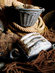 Image showing Closeup of fishing basket, lines and rope, net and storage of traditional equipment at port. Tools, fishery and mesh, vintage wood and old metal, retro cordage and antique fishnet in industry
