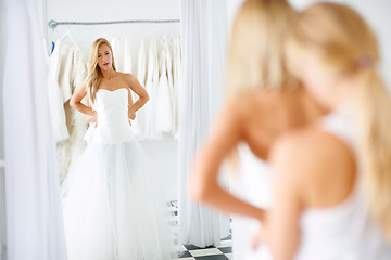 Image showing Wedding, mirror and young bride in dress in boutique, shop or store in mall for fitting. Retail, romance and female person from Canada preparing for marriage ceremony, party or reception for love.