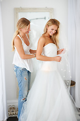 Image showing Wedding, fitting and bride with girl friend in a luxury boutique, shop or store mall. Retail, fashion and female person from Canada preparing for marriage ceremony, shopping or reception for love.