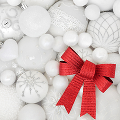 Image showing Christmas White Ornaments and Red Bow Background