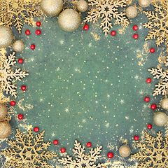 Image showing Christmas Gold Snowflake Holly Berry and Ball Background