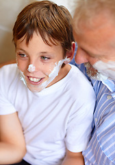 Image showing Father, boy and face with shaving cream and smile for grooming for development and learning at home. Happy family, man and child with foam or aftershave for hygiene, lifestyle or parenting with love