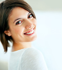 Image showing Happy, relax and face or portrait of a woman in a house for comfort, positivity and confidence. Smile, young and a person or girl standing in a home with pride, mockup and beautiful in an apartment