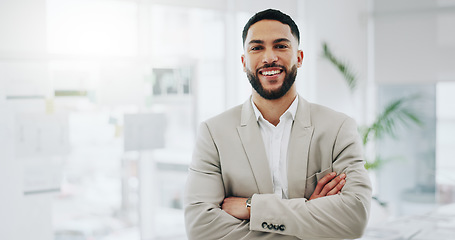 Image showing Business man, portrait and smile with arms crossed in an office for confidence and career pride. Professional entrepreneur person from Morocco at corporate company with positive attitude and space