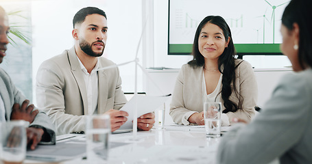 Image showing Business people, renewable energy and windmill in team discussion or meeting for proposal or planning. Diversity, future or men and women talk technology development, collaboration and innovation