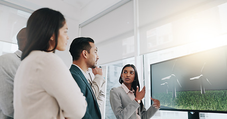 Image showing Presentation, renewable energy and windturbine with business people in meeting for planning, engineering and environment. Technology, research and sustainability with employees in office for workshop