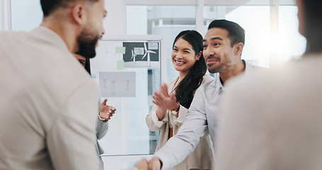 Image showing Happy businessman, handshake and applause in promotion, b2b or team agreement at office. Business people shaking hands and clapping in greeting, introduction or partnership for deal at workplace