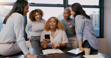 Image showing Teamwork, happy or business women with phone for gossip news, social media or blog content reading In office. Friends, startup or group of employee on smartphone smile for networking or communication