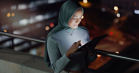 Image showing Balcony, tablet and night woman reading social network feedback, customer experience or e commerce. Brand monitoring data, Islamic info and Muslim media worker typing online survey review