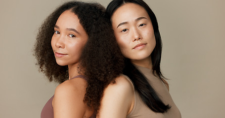 Image showing Women, friends and face for skincare, beauty or cosmetics with diversity on a brown studio background. Young model or people in portrait together for skin care, dermatology health and natural makeup